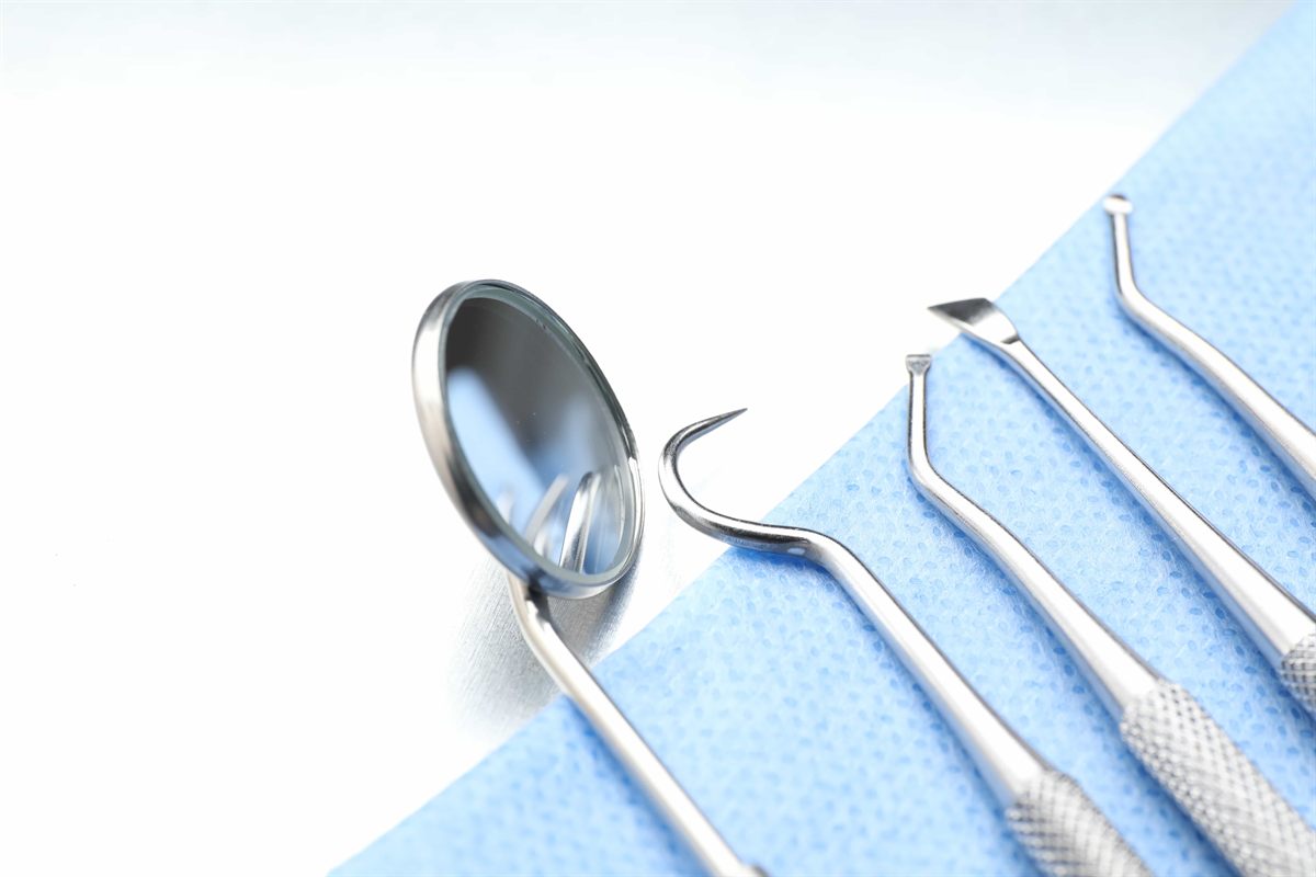 Sterile dental instruments laid out on a tray